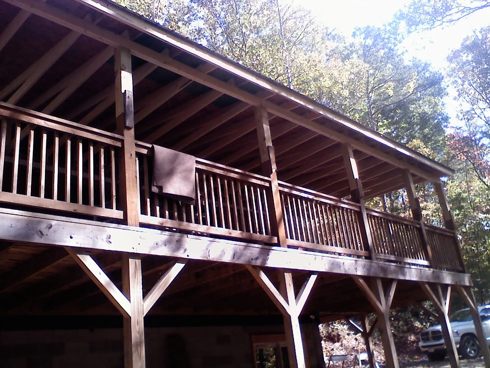 Timber framing under a new elevated porch and deck — Roof Leak Repair in Peshastin by Roofing Brothers